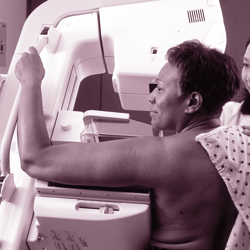 breast density FAQs woman in a mammogram breast cancer screening